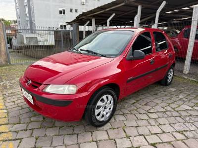 CHEVROLET - CELTA - 2004/2004 - Vermelha - R$ 21.900,00
